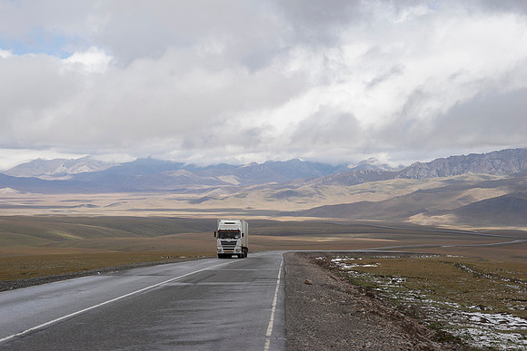 Endless trucks grinding up the pass